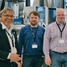 Bild på medarbetare från Wintershall framför kolväteskalibreringsrigg på Endress+Hauser Flow