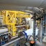 högprecisa mätkolvar på flödeskalibreringsrigg för kolväten på Endress+Hauser Flow i Reinach